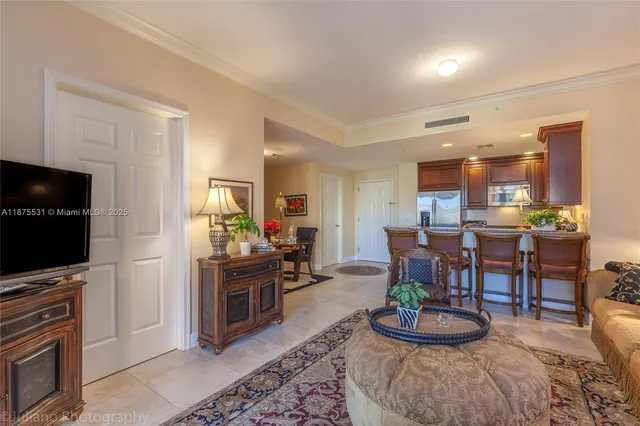 a kitchen with granite countertop a sink and a stove