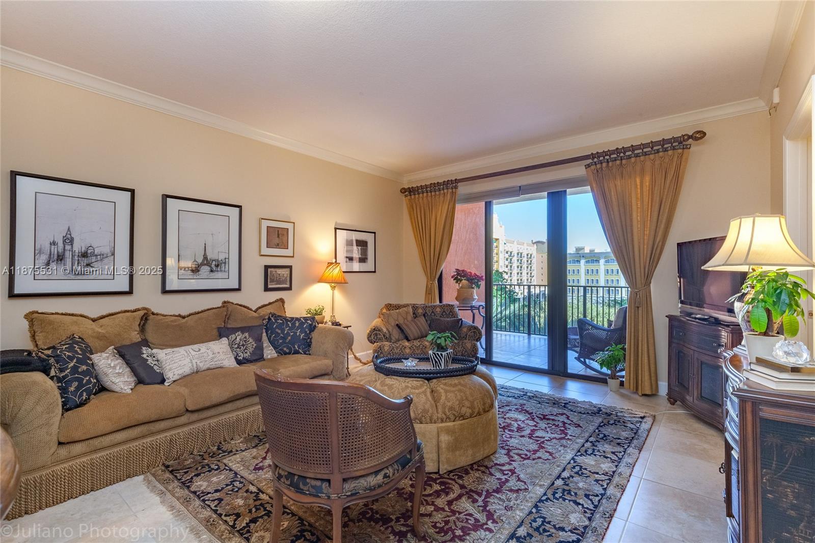 100 Andalusia Avenue, Unit 609 Coral Gables, FL 33134 - Photo 18 of 25 a living room with furniture and a window