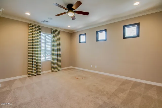a bathroom with a sink double vanity granite tub and a mirror