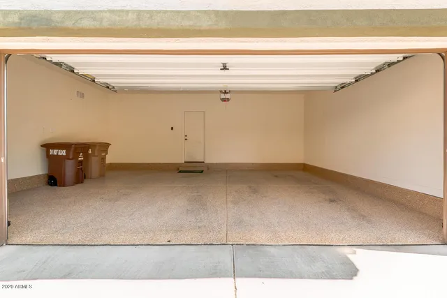 a view of a swimming pool with a lounge chairs