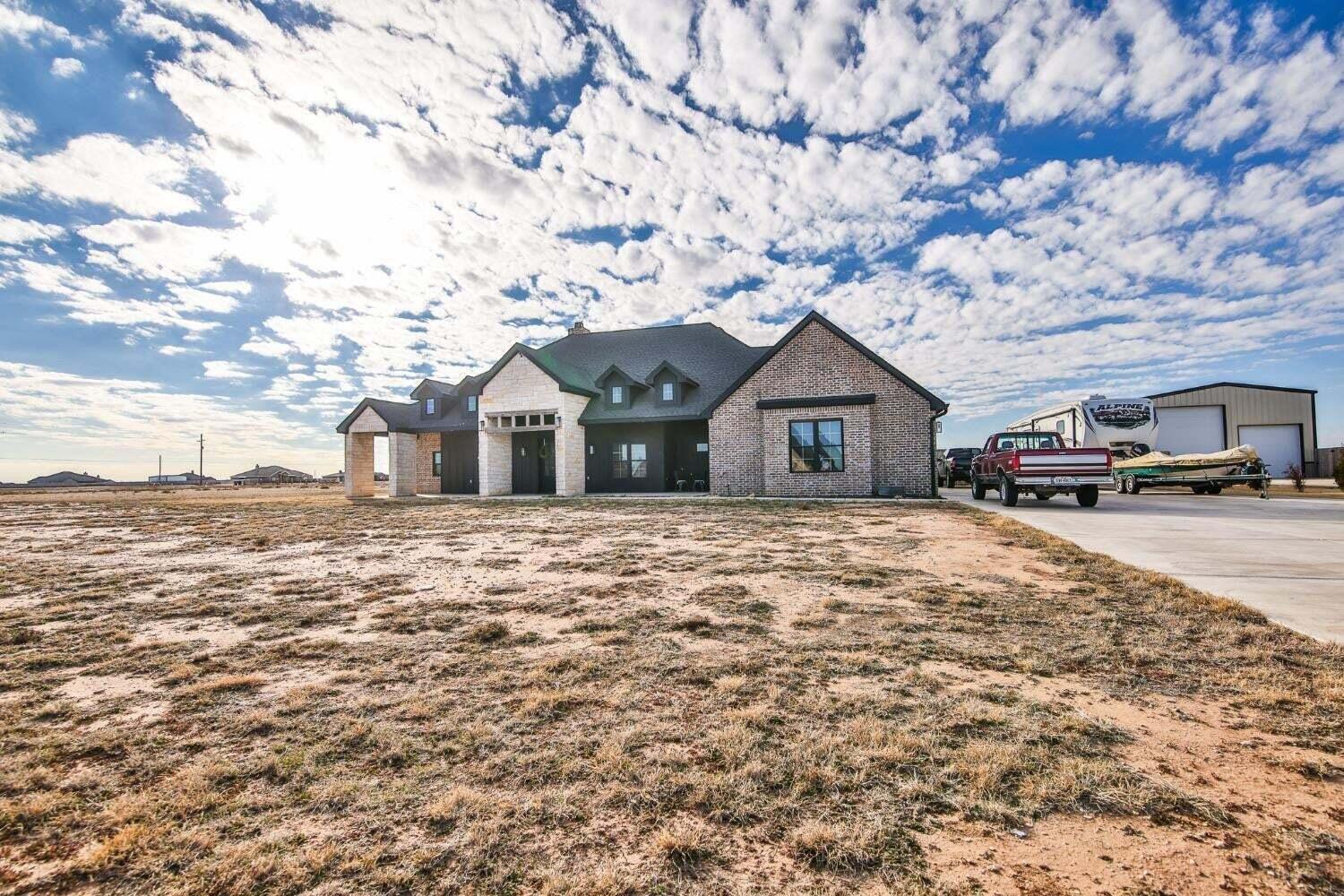 19210 County Road 2240 Lubbock, TX 79423 - Photo 45 of 46 a house with a outdoor space