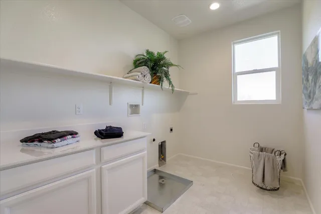 a view of a entryway with cabinet and window