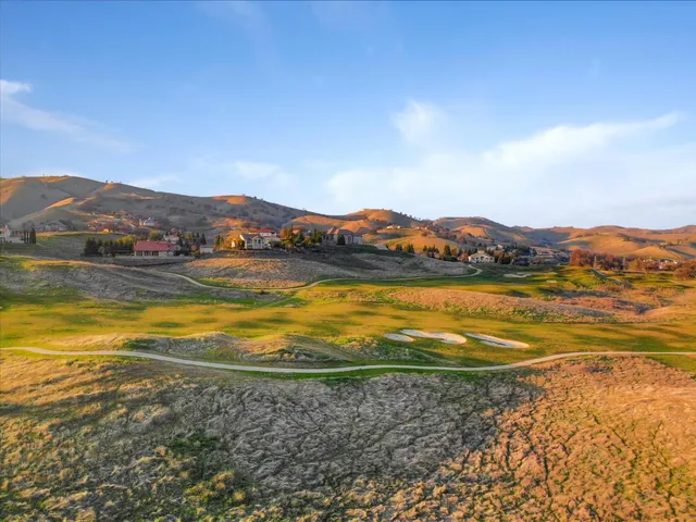 a view of an ocean and a mountain