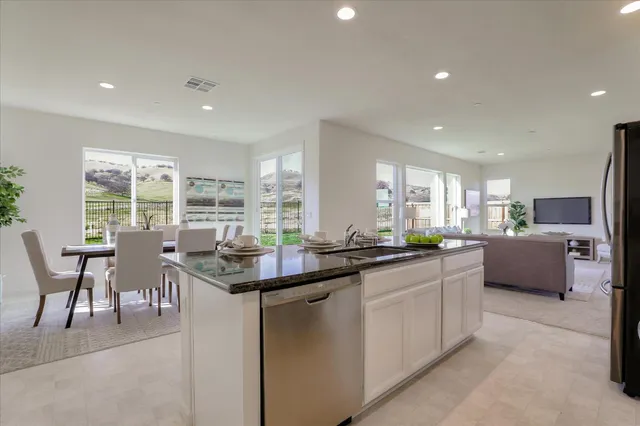 a kitchen with sink cabinets and counter top space