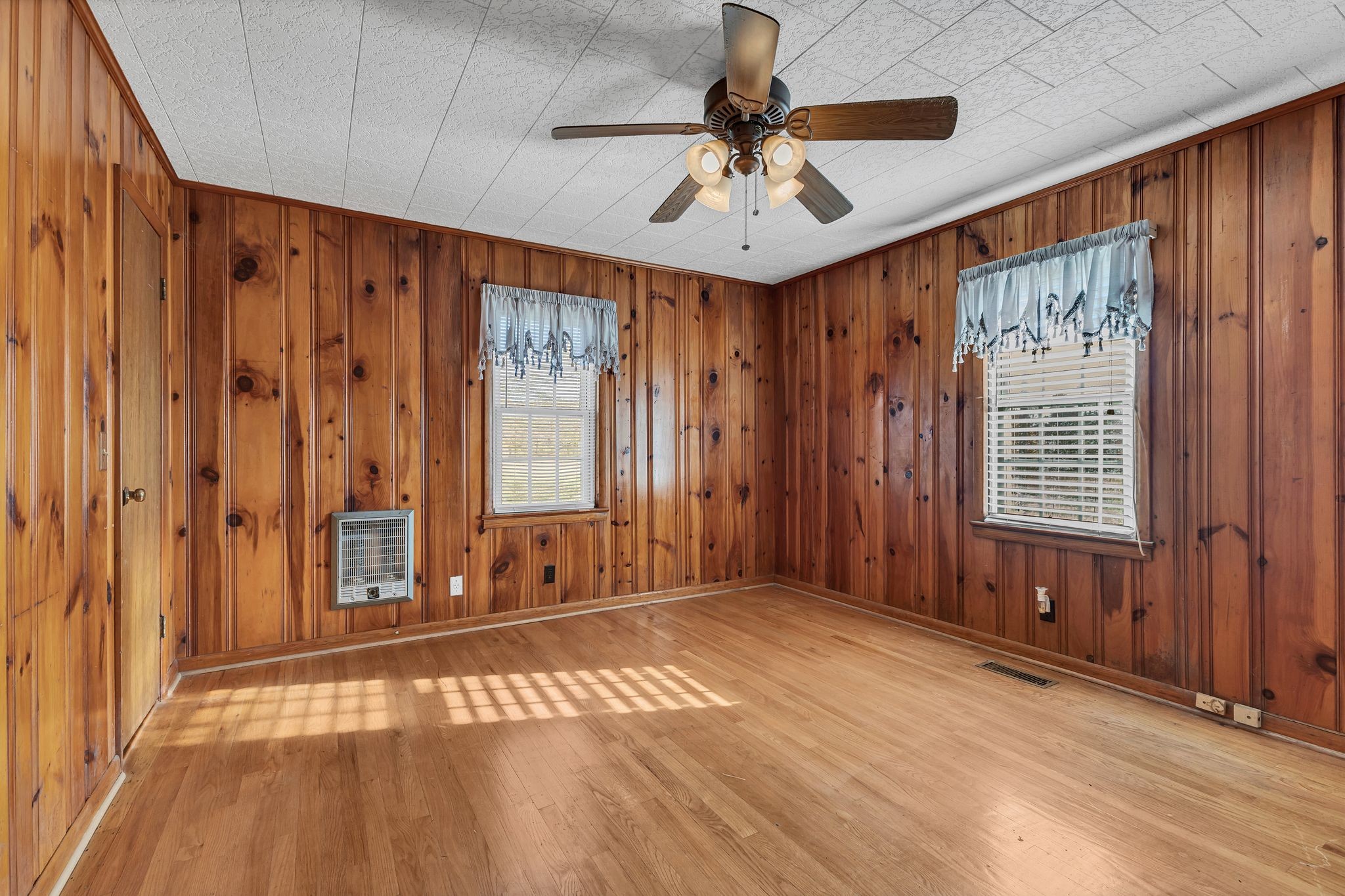 275 Pond Rail Road Dickson, TN 37055 - Photo 16 of 72 a view of an empty room with a window and a chandelier