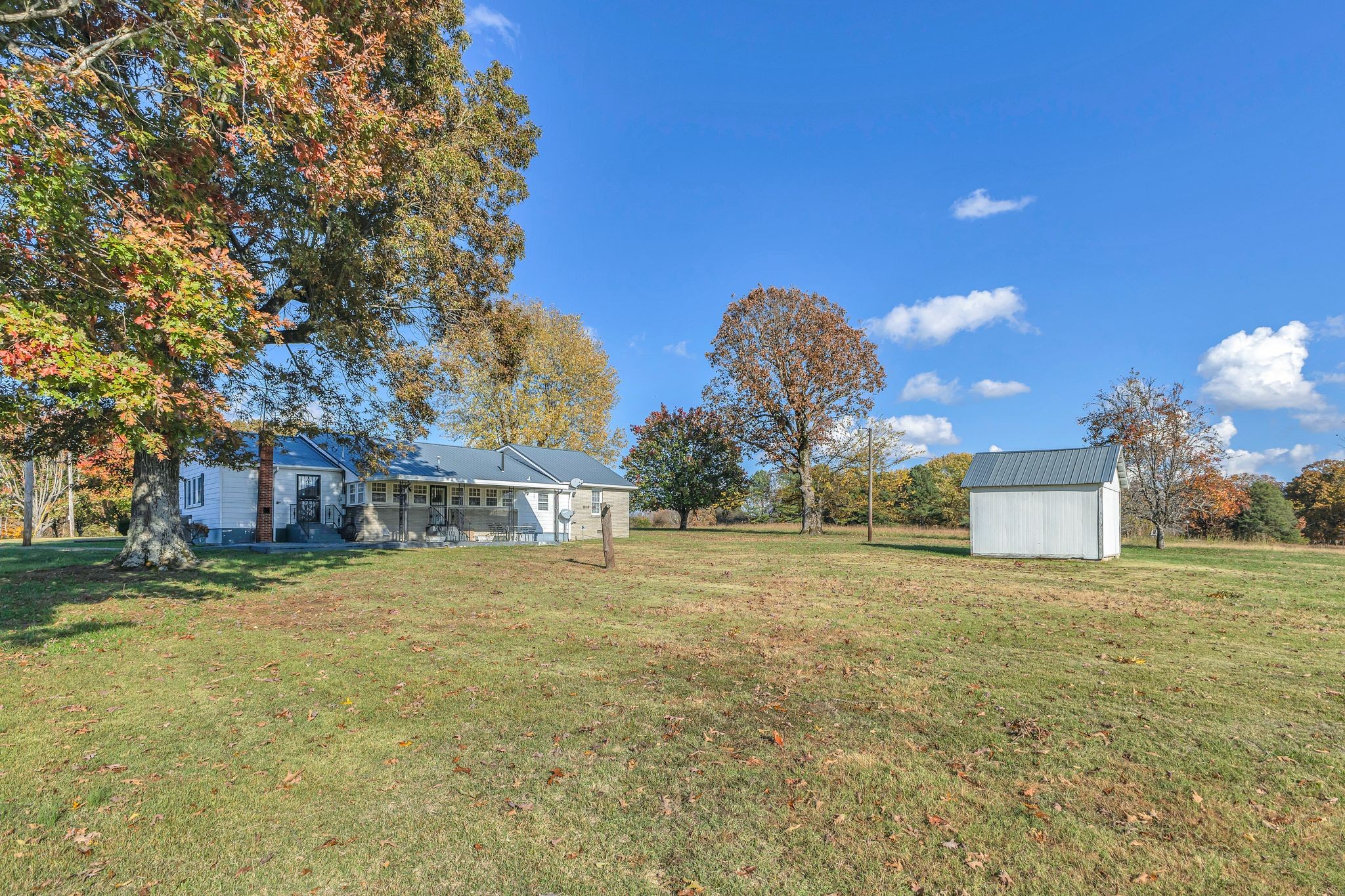 275 Pond Rail Road Dickson, TN 37055 - Photo 28 of 72 a view of a big yard in front of a house