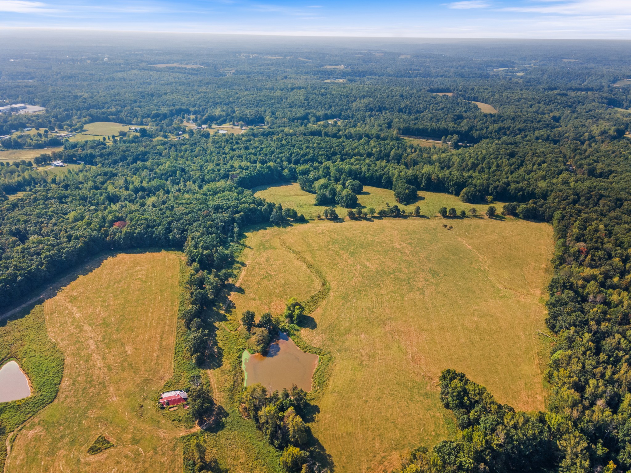 275 Pond Rail Road Dickson, TN 37055 - Photo 40 of 72 an aerial view of a house with a lake view
