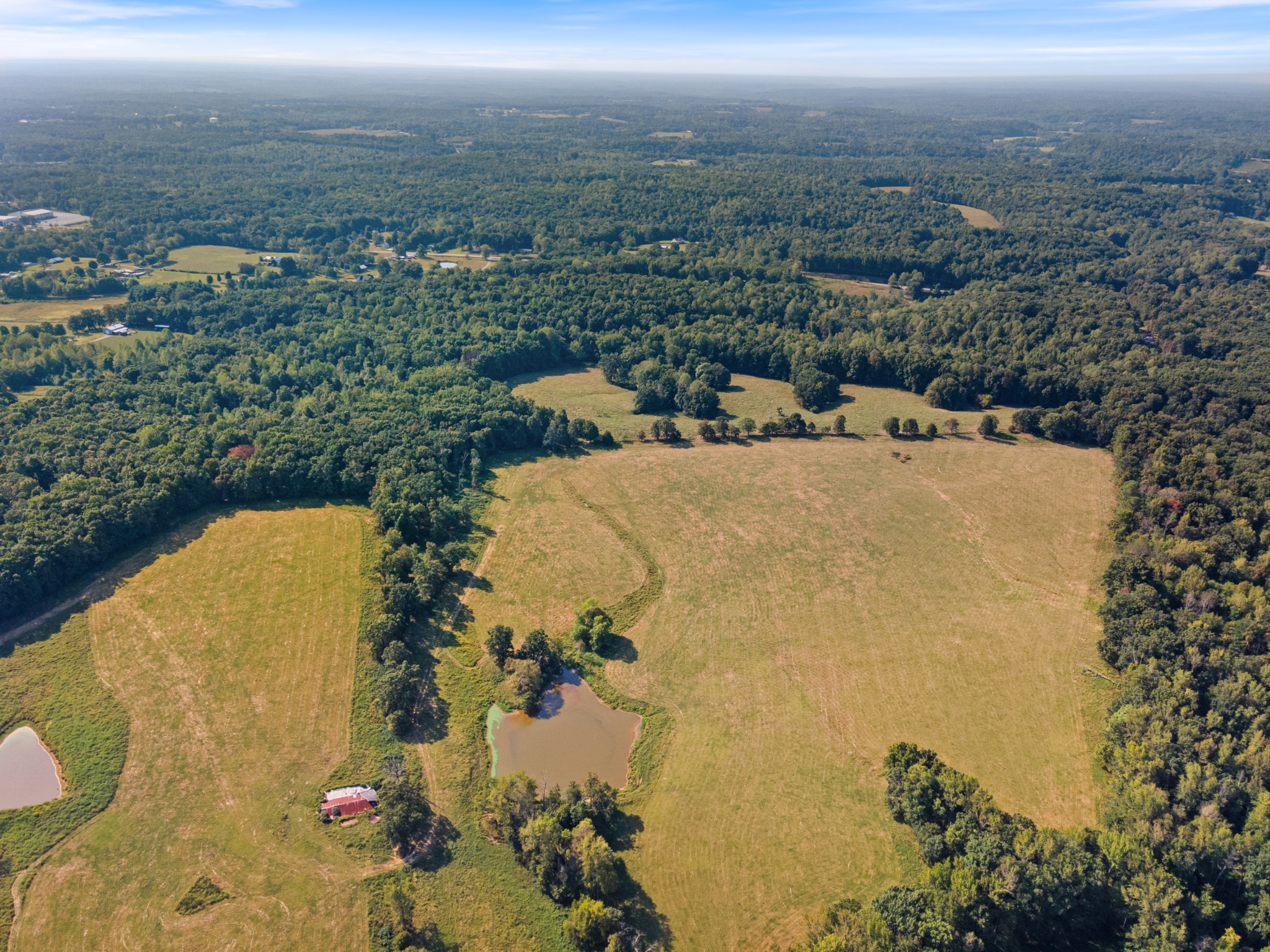 275 Pond Rail Road Dickson, TN 37055 - Photo 57 of 72 an aerial view of a house with a yard
