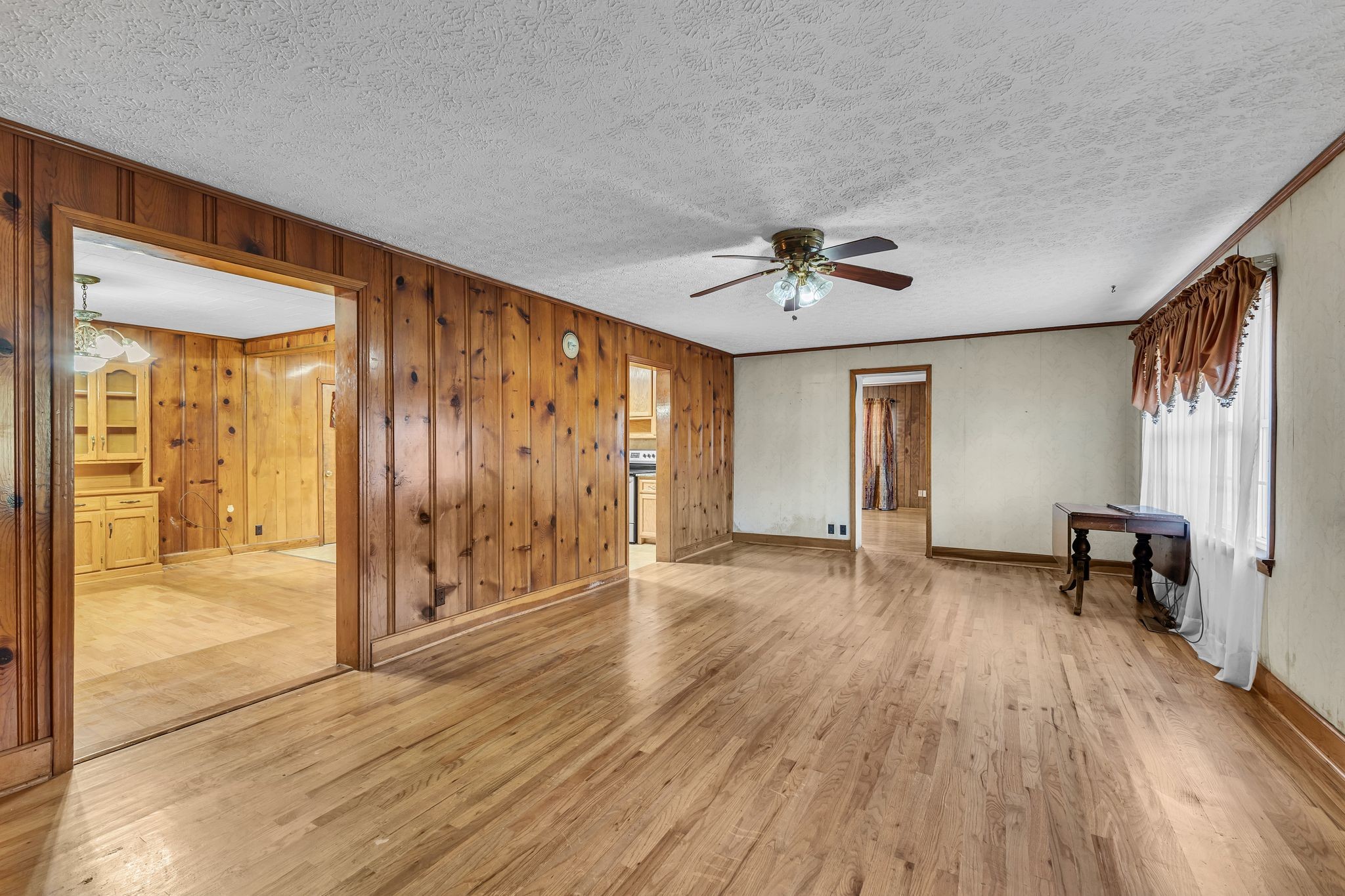 275 Pond Rail Road Dickson, TN 37055 - Photo 8 of 72 wooden floor in an empty room with a window