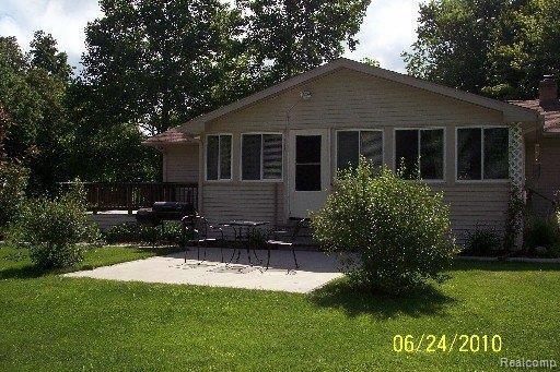 5015 North Burkhart Road Howell, MI 48855 - Photo 12 of 18 5015 REAR 2