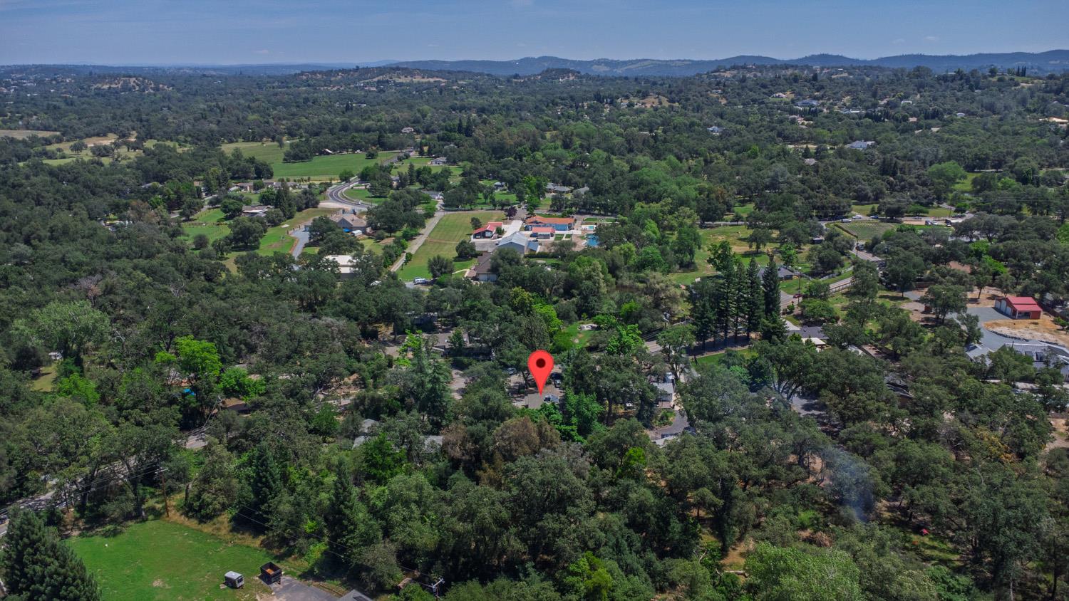 6332 Horseshoe Bar Road Loomis, CA 95650 - Photo 80 of 85 Expansive forested landscape featuring mature trees and distant hills