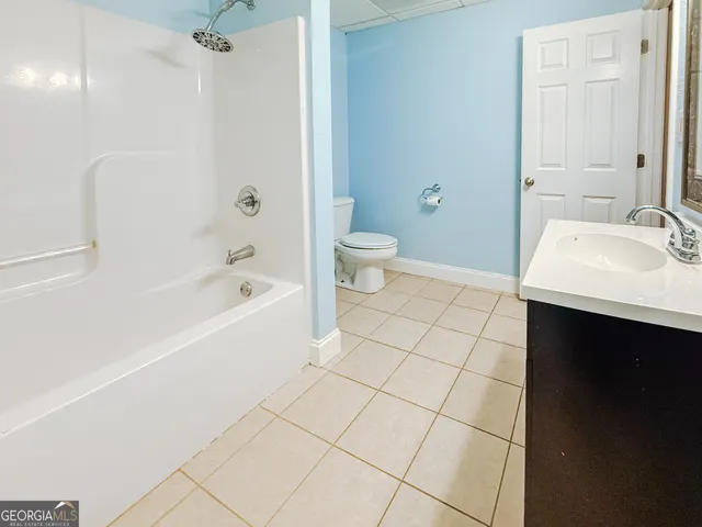 a view of a balcony with wooden floor