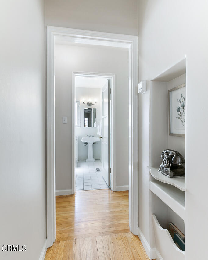 982 Athens Street Altadena, CA 91001 - Photo 12 of 25 a view of a hallway and wooden floor a living room