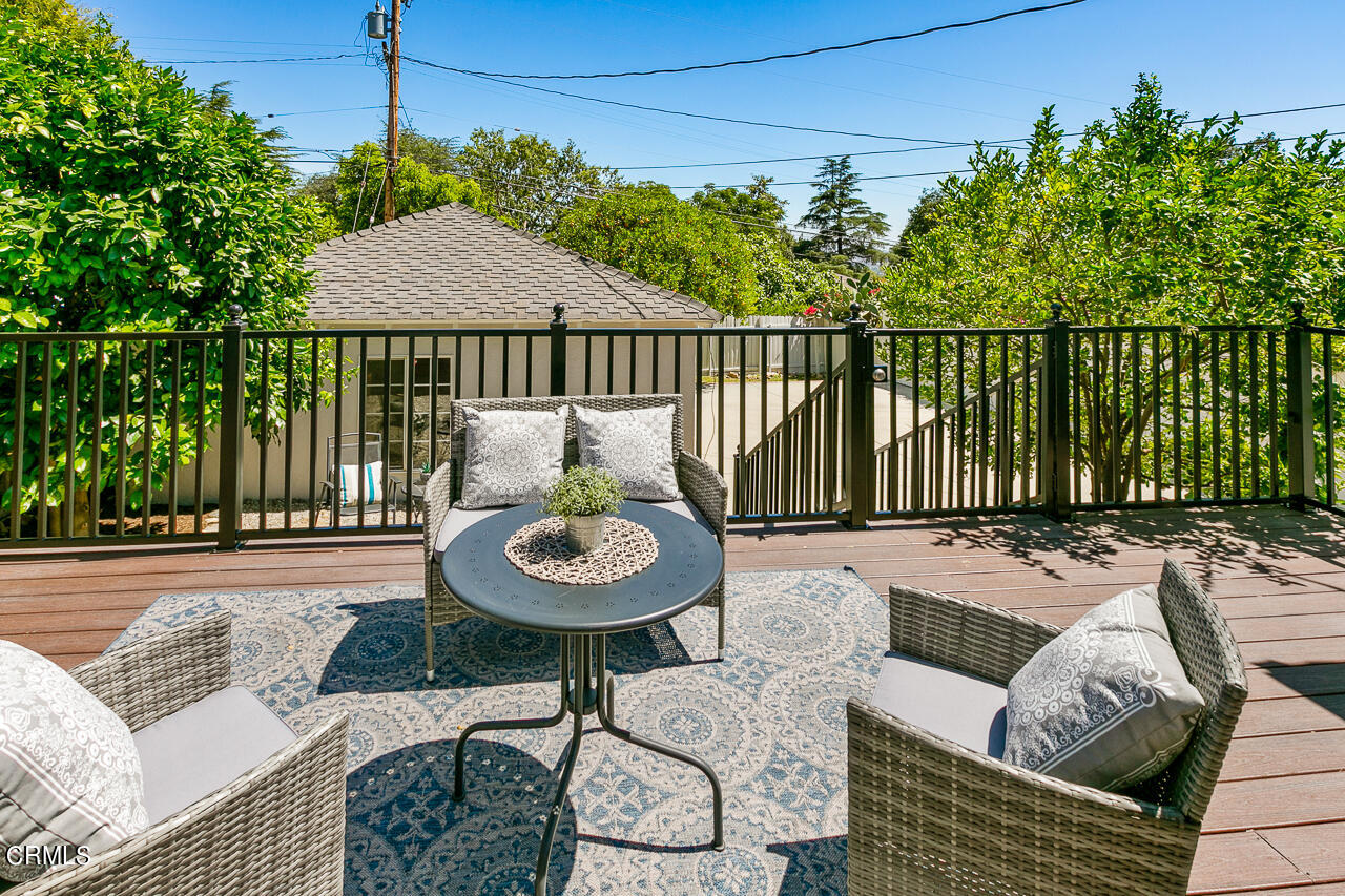 982 Athens Street Altadena, CA 91001 - Photo 19 of 25 a view of a patio with couches table and chairs