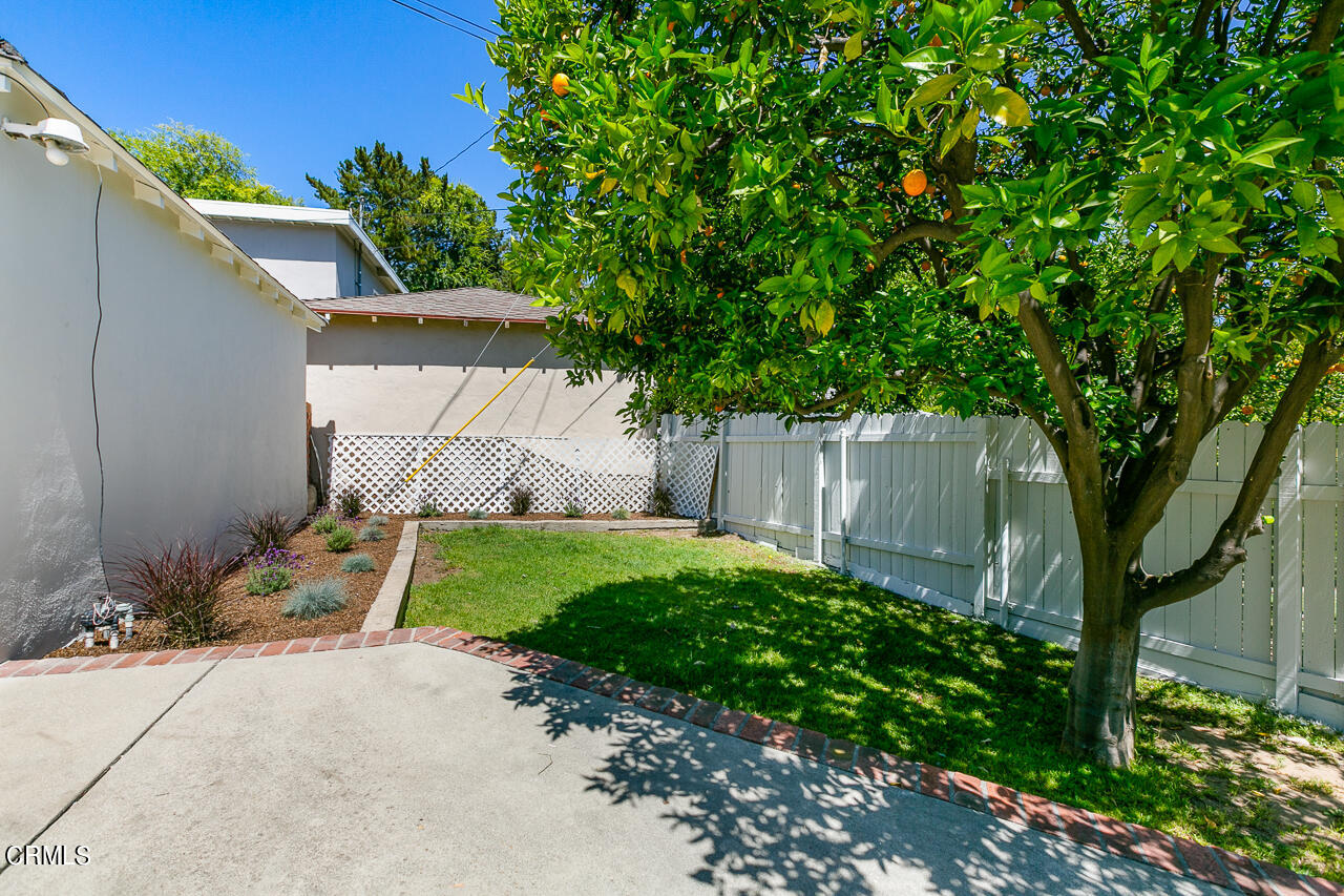 982 Athens Street Altadena, CA 91001 - Photo 22 of 25 a backyard of a house with lots of green space
