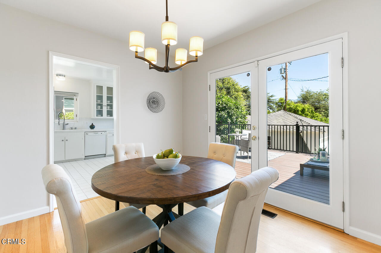 982 Athens Street Altadena, CA 91001 - Photo 6 of 25 a view of a dining room with furniture window and outside view