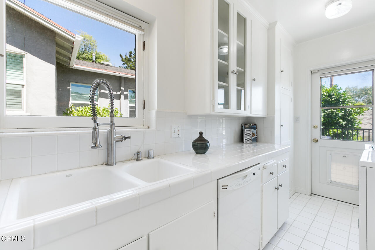 982 Athens Street Altadena, CA 91001 - Photo 9 of 25 a bathroom with a sink and a bathtub
