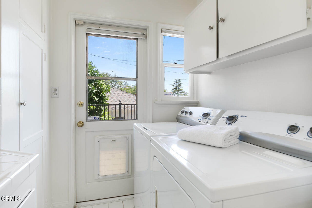982 Athens Street Altadena, CA 91001 - Photo 10 of 25 a bedroom with a bed and a window