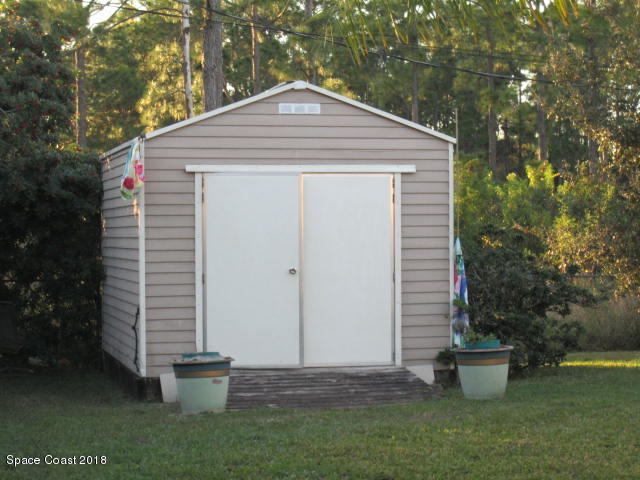 930 Degroodt Road Southwest Palm Bay, FL 32908 - Photo 23 of 29 Storage Shed