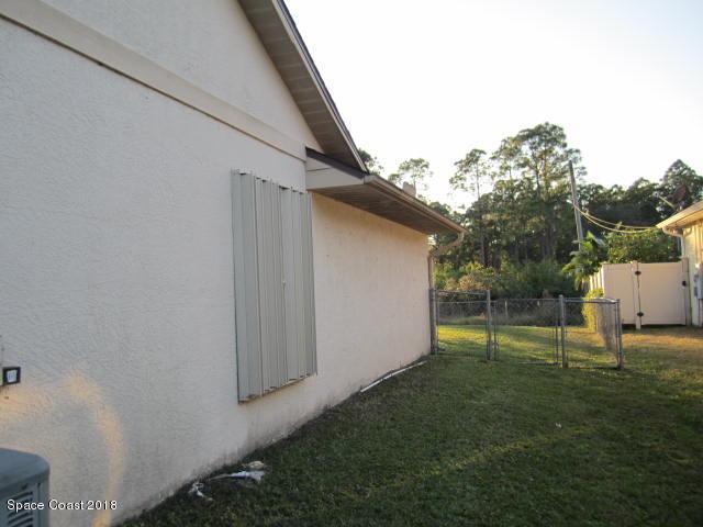 930 Degroodt Road Southwest Palm Bay, FL 32908 - Photo 25 of 29 Accordion Shutters
