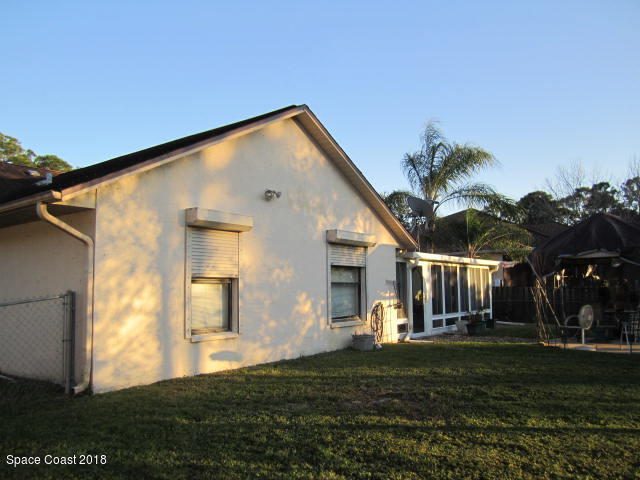 930 Degroodt Road Southwest Palm Bay, FL 32908 - Photo 26 of 29 Side View Roll down shutters