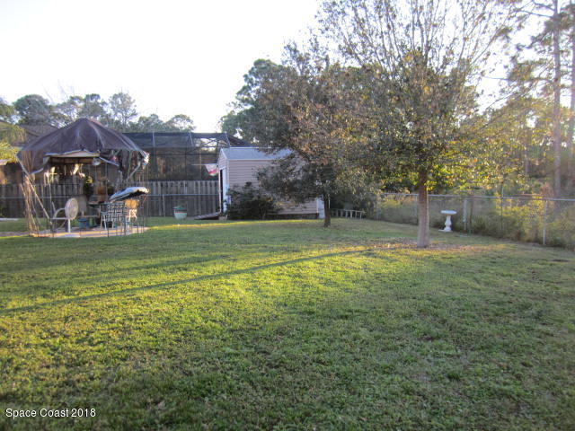 930 Degroodt Road Southwest Palm Bay, FL 32908 - Photo 27 of 29 Large Fenced Yard