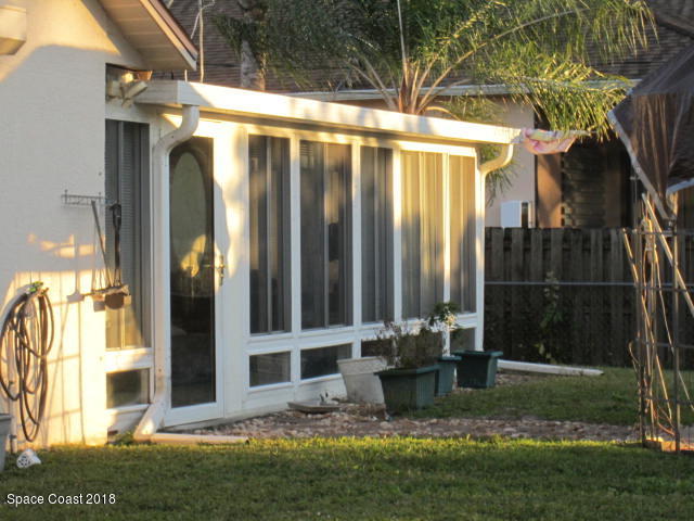 930 Degroodt Road Southwest Palm Bay, FL 32908 - Photo 28 of 29 Back View of Florida Room