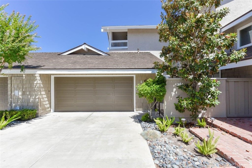 Private entry to this beautiful home with the largest lot in the community.