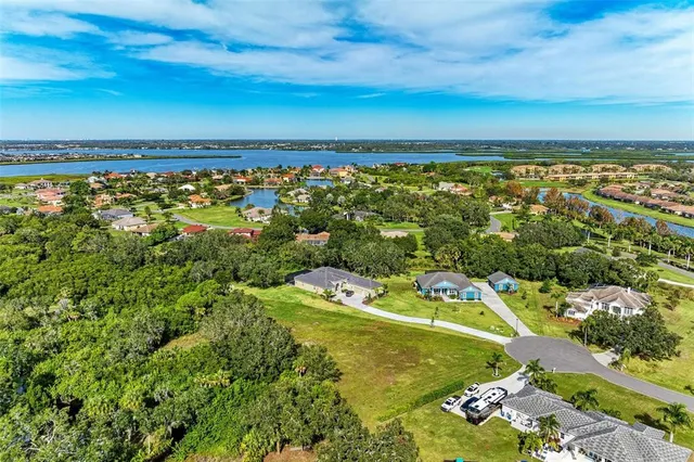 a view of a city with an ocean view