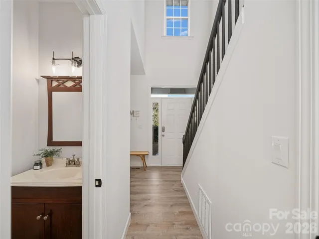 a view of a bathroom from the hallway