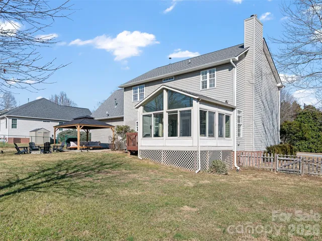a house view with a garden space