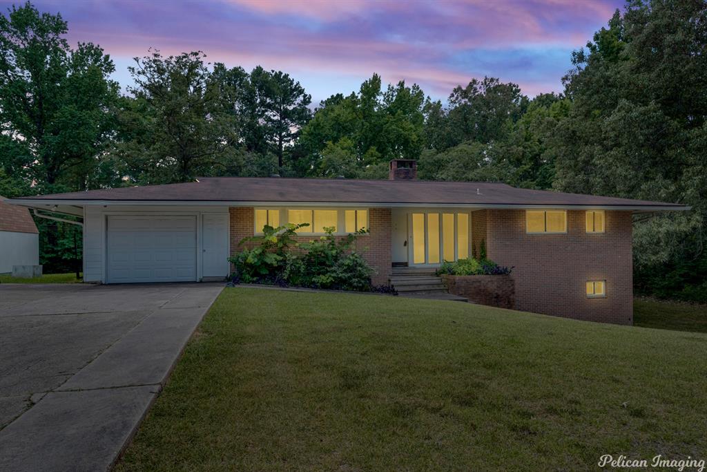 6623 Jefferson Paige Road Shreveport, LA 71119 - Photo 1 of 1 a view of a house with backyard and garden