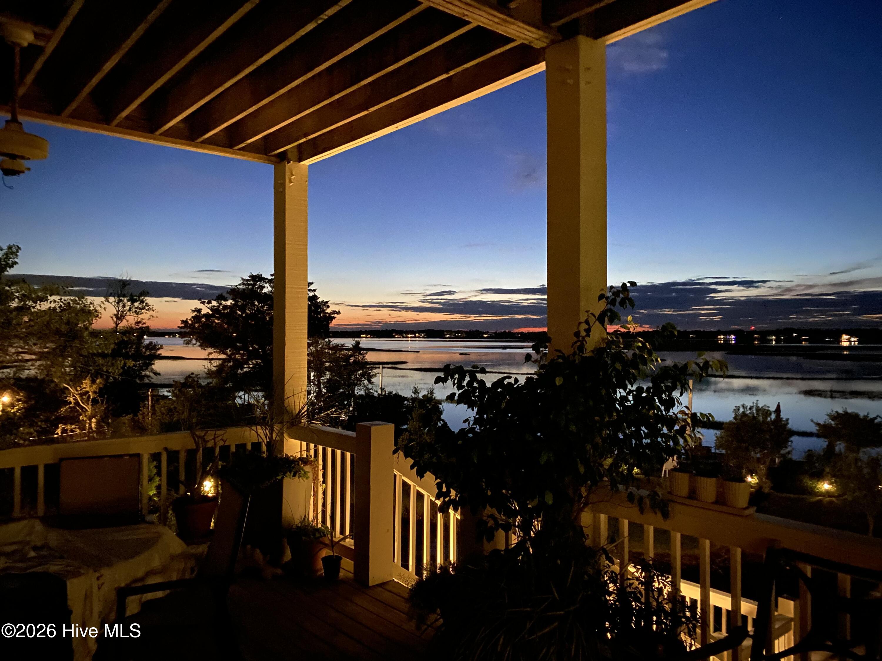 10 W Ridge Surf City, NC 28445 - Photo 56 of 86 twilight view from covered decking