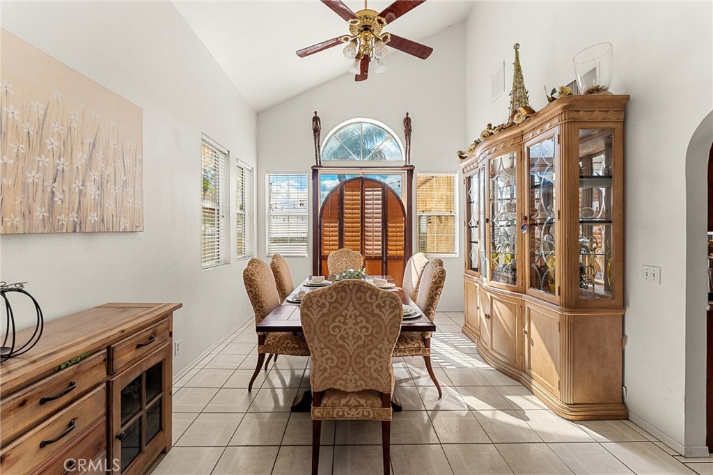 17234 Gamble Avenue Riverside, CA 92504 - Photo 11 of 56 a view of a dining room with furniture and chandelier