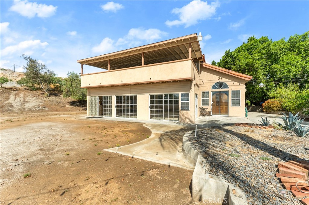17234 Gamble Avenue Riverside, CA 92504 - Photo 43 of 56 a front view of a house with a yard