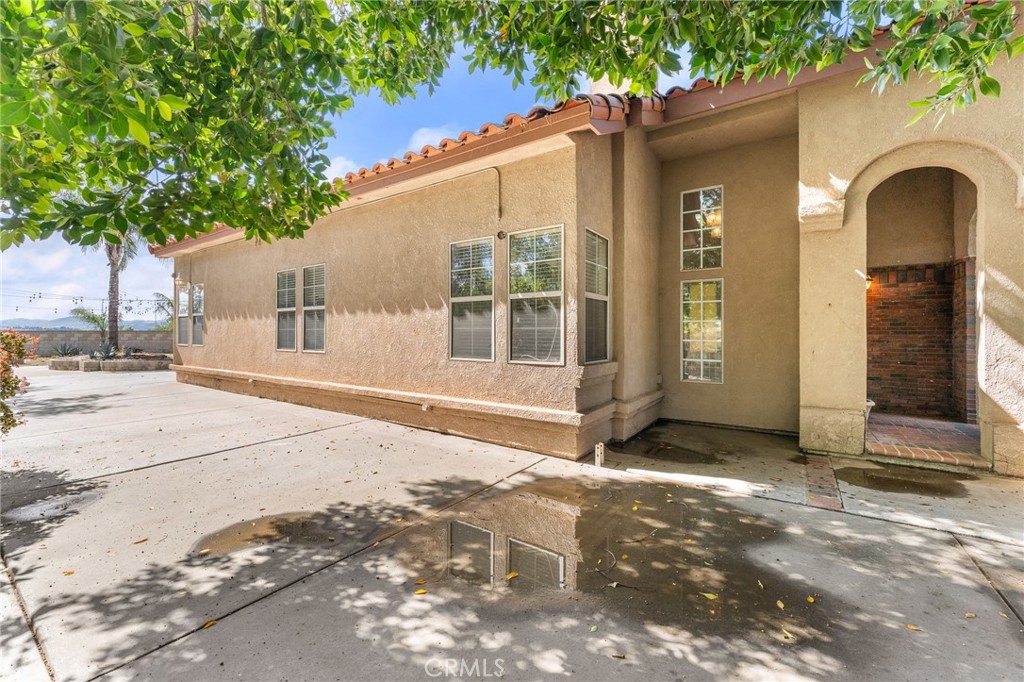 17234 Gamble Avenue Riverside, CA 92504 - Photo 50 of 56 a view of a house with a snow in the background