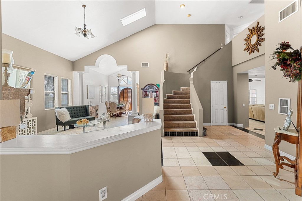 17234 Gamble Avenue Riverside, CA 92504 - Photo 8 of 56 a room with lots of white furniture and window