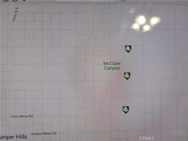 a bathroom with a light fixture and a shower