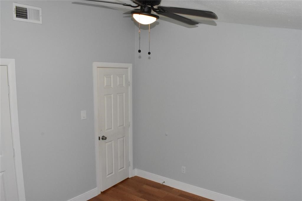 15 Walnut Lane Point Blank, TX 77364 - Photo 18 of 31 a view of a small space with wooden floor