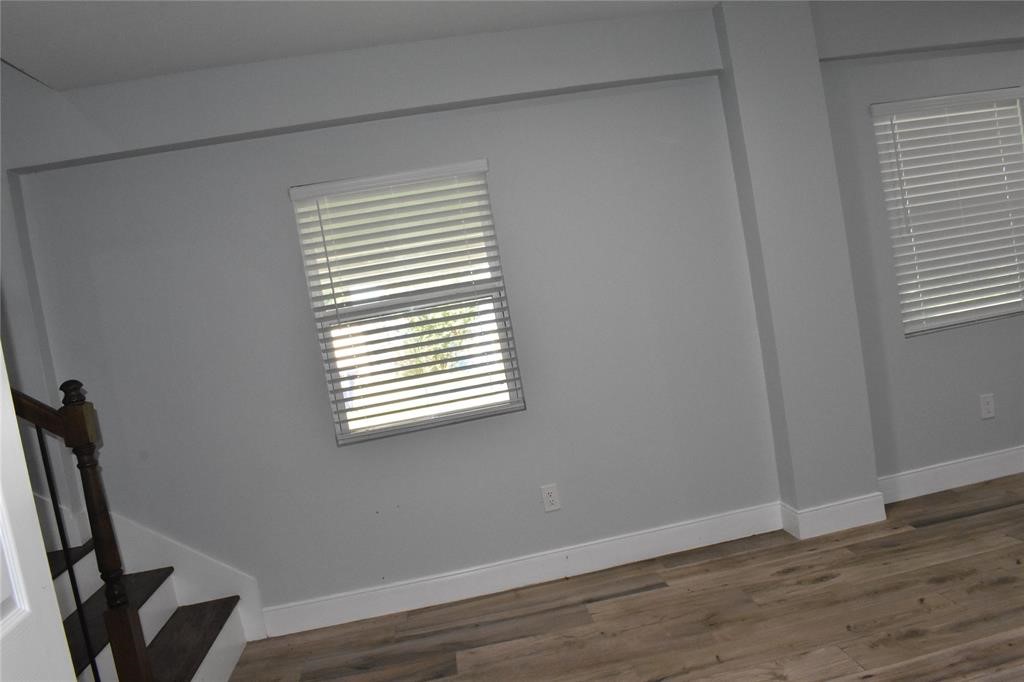 15 Walnut Lane Point Blank, TX 77364 - Photo 27 of 31 a view of a room with wooden floor and a window