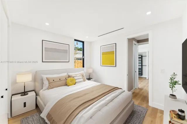 a bathroom with a toilet sink and a mirror
