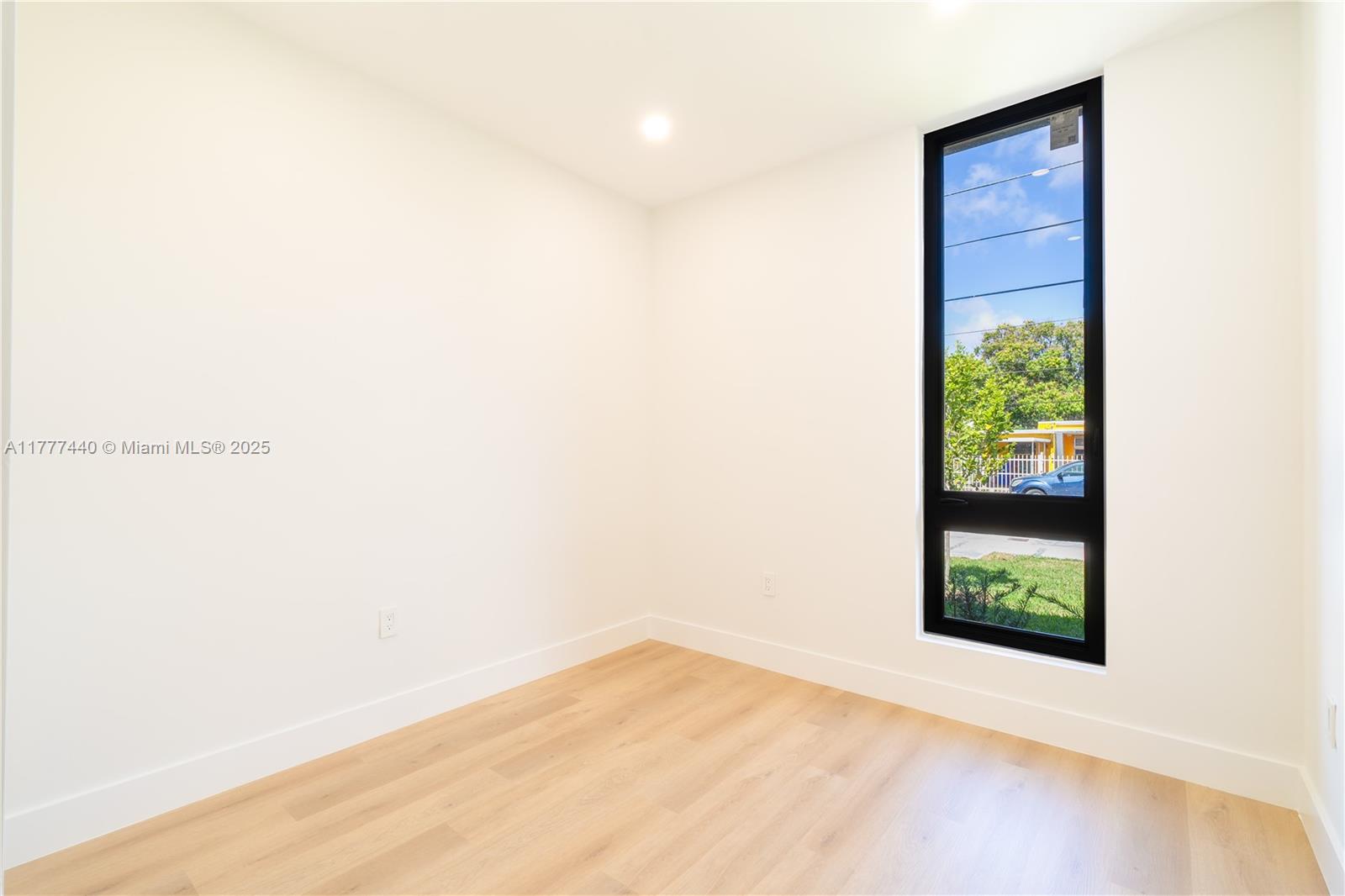 412 Northwest 47th Street Miami, FL 33127 - Photo 44 of 62 a view of a small space with a window