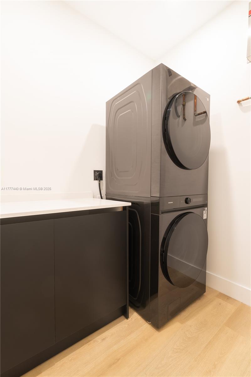 412 Northwest 47th Street Miami, FL 33127 - Photo 45 of 62 a bathroom with a sink and a mirror