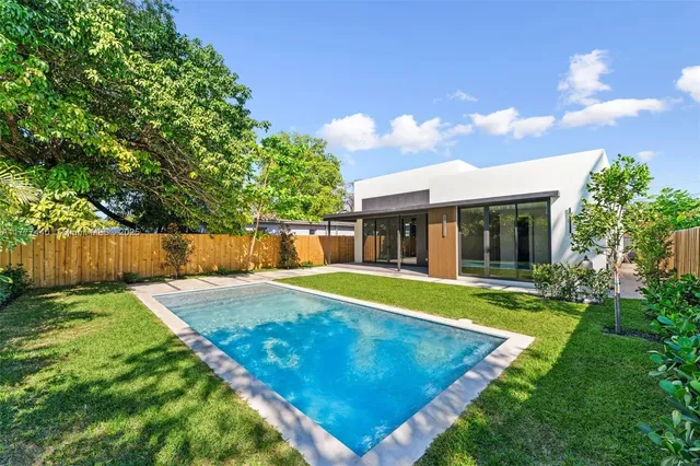 a view of a building with traffic signal lights