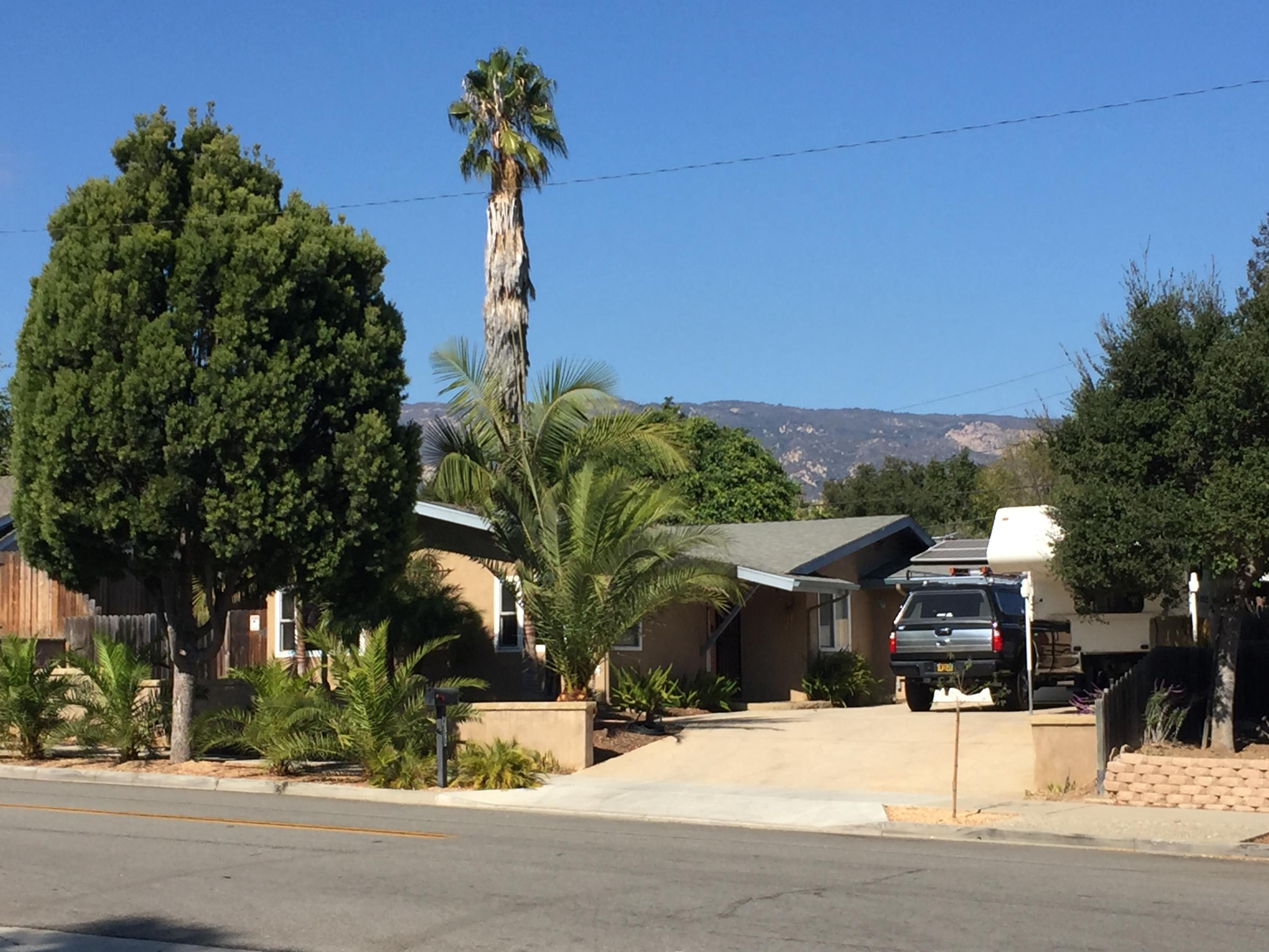 a view of a house with a street