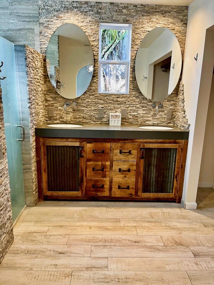 7020 Del Norte Drive Goleta, CA 93117 - Photo 13 of 23 a bathroom with a sink and a mirror