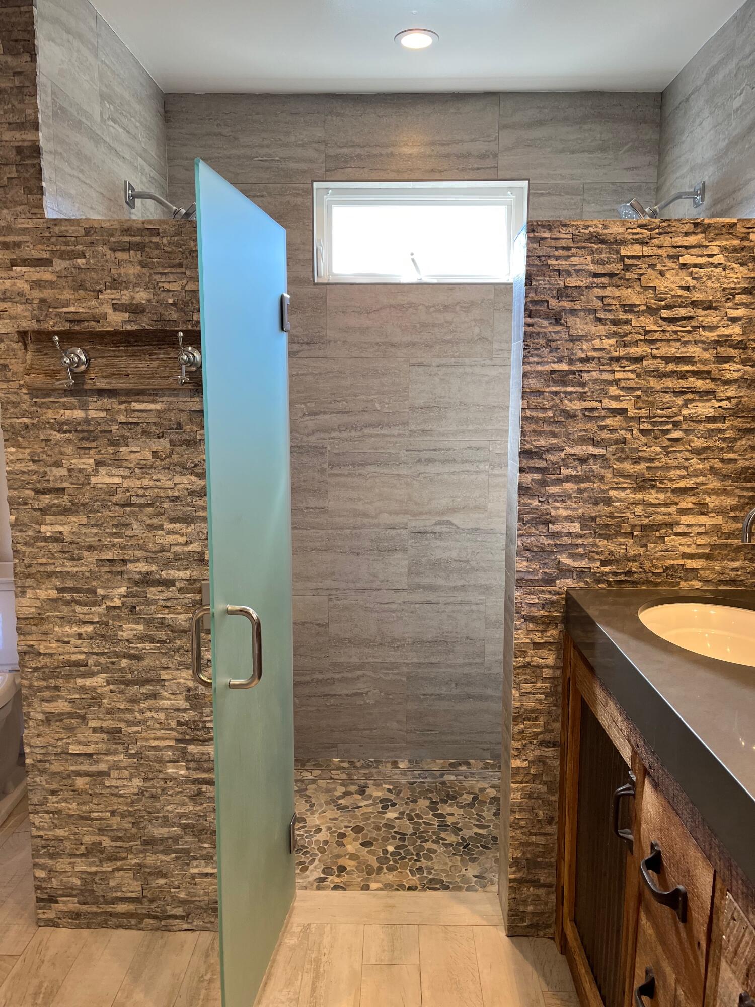 7020 Del Norte Drive Goleta, CA 93117 - Photo 16 of 23 a bathroom with a sink and a shower