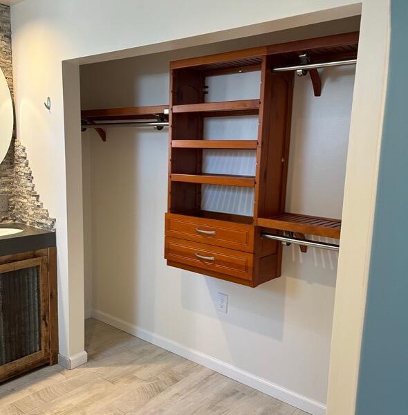7020 Del Norte Drive Goleta, CA 93117 - Photo 18 of 23 a view of walk in closet with empty racks