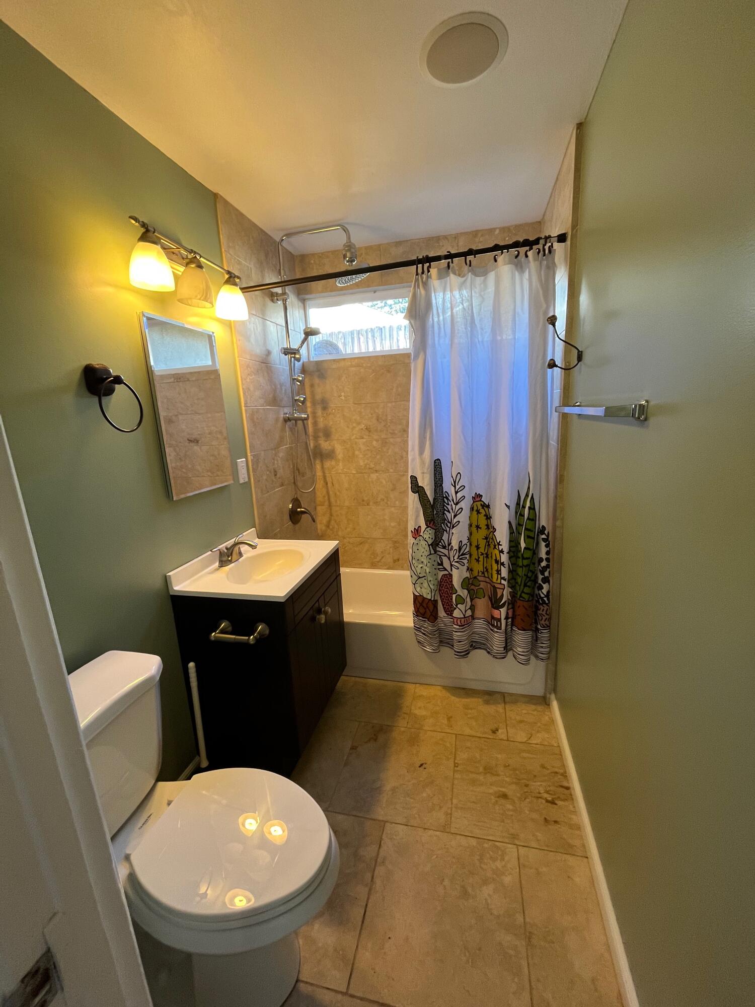 7020 Del Norte Drive Goleta, CA 93117 - Photo 19 of 23 a bathroom with a sink toilet and shower