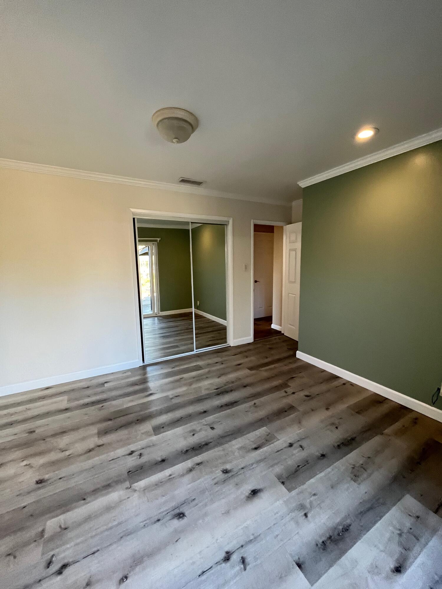 7020 Del Norte Drive Goleta, CA 93117 - Photo 21 of 23 wooden floor in an empty room with a window